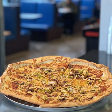 Mother Clucker's Pizza