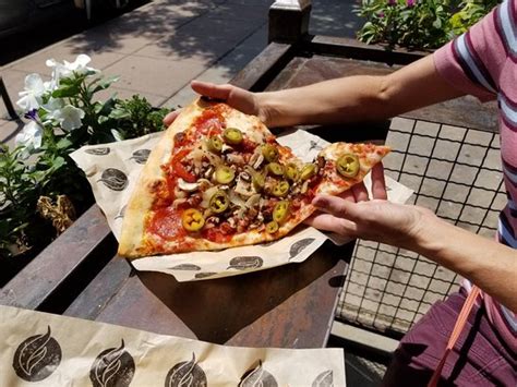 Atomic Cowboy home of Denver Biscuit Co & Fat Sully's NY Pizza