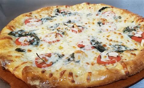 Halwani's Pizza & Stromboli - Grandview Location